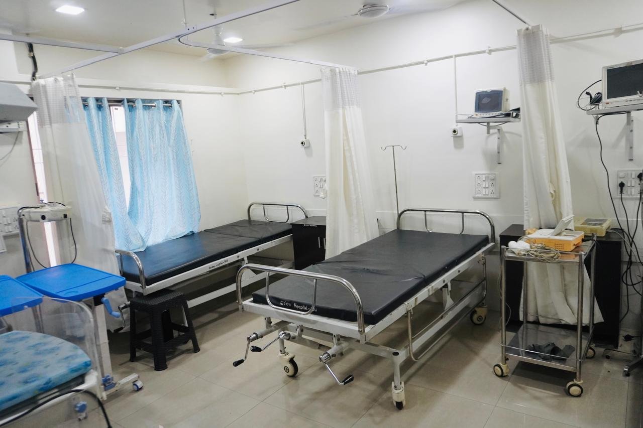 Patient ward with beds at Orion Hospital